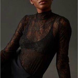 By Anthropologie Sheer
Lace Turtleneck